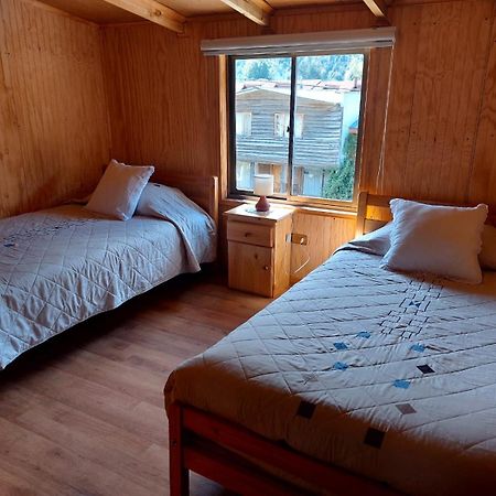 Hostal Y Cabanas Ventisquero Puerto Puyuguapi Buitenkant foto