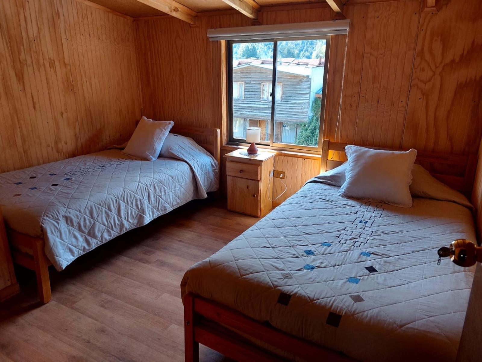 Hostal Y Cabanas Ventisquero Puerto Puyuguapi Buitenkant foto