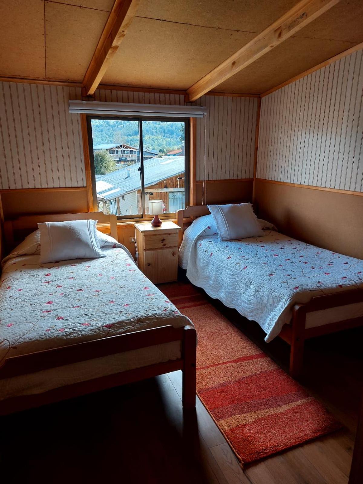 Hostal Y Cabanas Ventisquero Puerto Puyuguapi Buitenkant foto